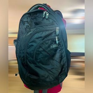 REI Travel backpack light with laptop sleeve. Expandable/Mulitple storage